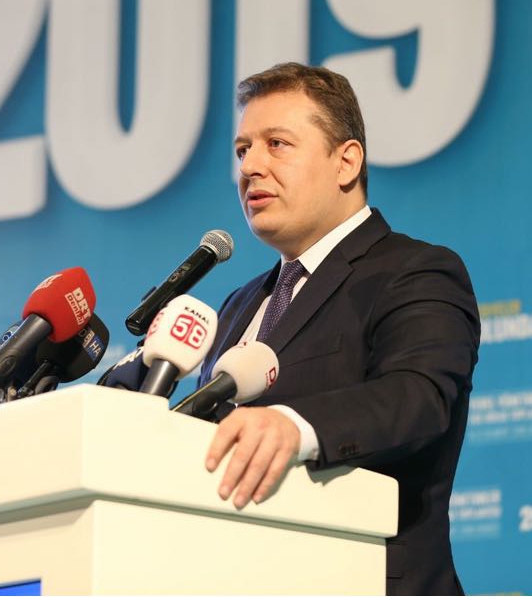 Necip Filiz addressing a large audience at a political event